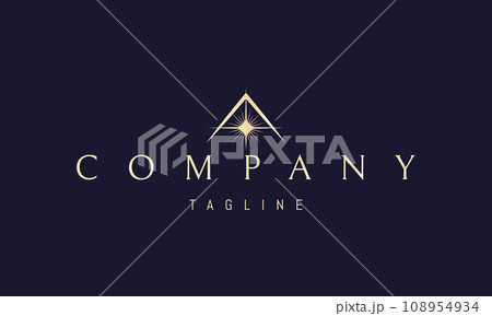 A vector golden logo with an abstract image of a shining star on a mountain background. 108954934