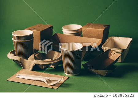 Packaging concept - selection of paper craft packaging on green 108955222