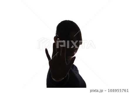 Young beautiful girl strongly against offers, denial, stop - silhouette Young beautiful girl strongly against offers, denial, stop - silhouette 108955761