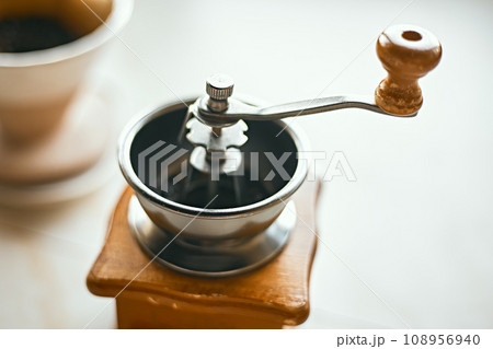 a manual coffee grinder a manual coffee grinder 108956940