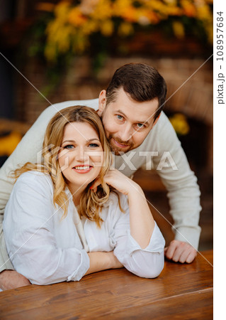 Happy married couple in retro interior of a country house.  108957684