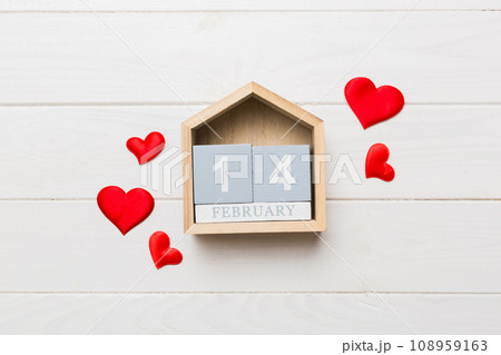 Valentine Day theme with wooden block calendar. Greeting card template for Valentines Day copy space for text Valentine Day theme with wooden block calendar. Greeting card template for Valentines Day copy space for text 108959163