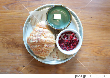 croissant ,French croissant or chocolate croissant or French bread with butter and blueberry dressing croissant ,French croissant or chocolate croissant or French bread with butter and blueberry dressing 108960847