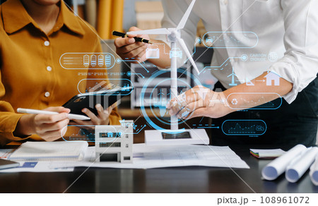 ESG concept of environmental, Green ethical business preserving resources, reducing CO2, Business person team working on laptop virtual smartphone to reduce CO2 emissions carbon . 108961072