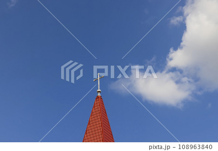 catholic christian cross on a blue sky background 108963840