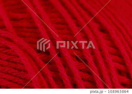 woolen threads of red color for knitting knitting close-up 108963864