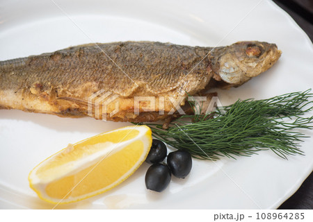 Fried grayling fish 108964285