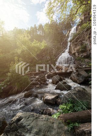 Waterfall Kamishlinsky in the Altai Mountains Waterfall Kamishlinsky in the Altai Mountains 108964319