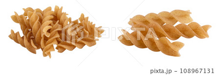 Wolegrain fusilli pasta from durum wheat isolated on white background with full depth of field. Wolegrain fusilli pasta from durum wheat isolated on white background with full depth of field. 108967131