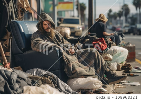 Homeless people on the streets of a sunny city 108968321