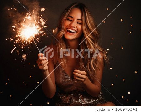 Beautiful young woman in sequined dress having fun on New Year party, happy pretty lady dancing and laughing on holidays with sparkles and bokeh lights 108970341