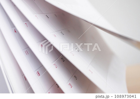 Calendar page flipping sheet close up blur background business schedule planning appointment meeting concept 108973041