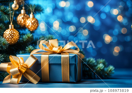 Christmas gift box and christmas decoration on wood background. Bokeh light. Christmas gift box and christmas decoration on wood background. Bokeh light. 108973819