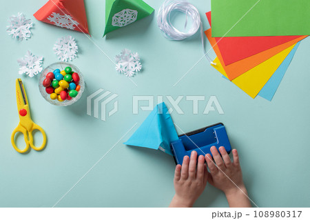 Advent calendar made of colored paper. Diy for children. flat lay Advent calendar made of colored paper. Diy for children. flat lay 108980317