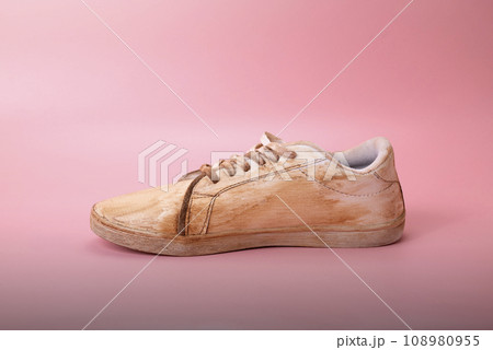 Closeup view of dirty white sneakers 108980955