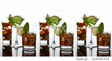 Group cocktail cola with whiskey mojito Group cocktail cola with whiskey mojito 108986334