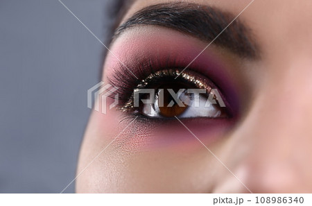 Make-up eye of young attractive woman beauty portrait Make-up eye of young attractive woman beauty portrait 108986340