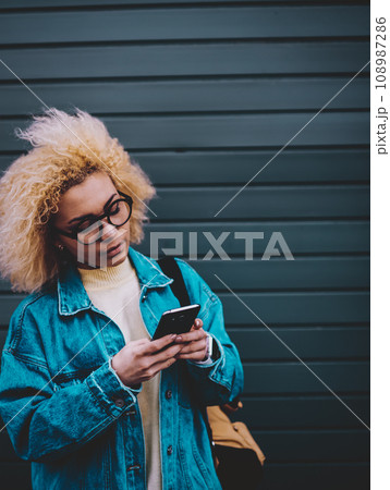attractive female student searching media file attractive female student searching media file 108987286