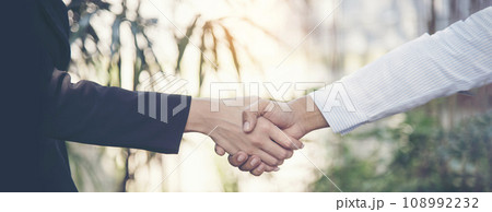 Banner Trust honesty business customer handshake together promise partner. Panorama Businessman teamwork diversity solidarity team Partner hands together. Team meeting shaking hands with copy space 108992232