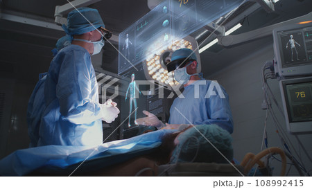 3D graphics of holographic display showing vital signs during surgery 108992415