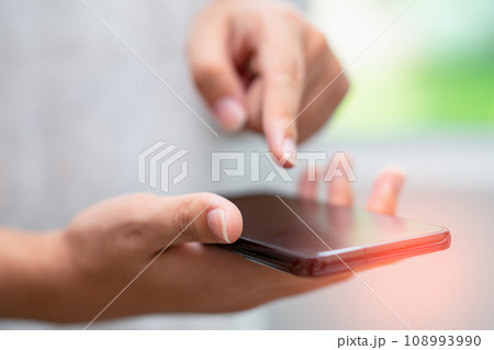 Teenage using social media with mobile phone, chat, website, shopping online. Teenage using social media with mobile phone, chat, website, shopping online. 108993990