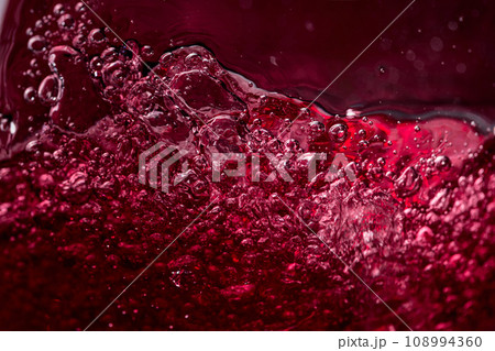 Abstract splashing of red wine. Abstract splashing of red wine. 108994360
