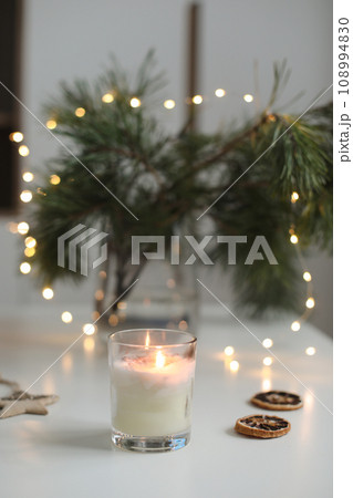 Christmas background with fir tree branches and tangerines. Merry Christmas and Happy New Year Greeting Card 108994830