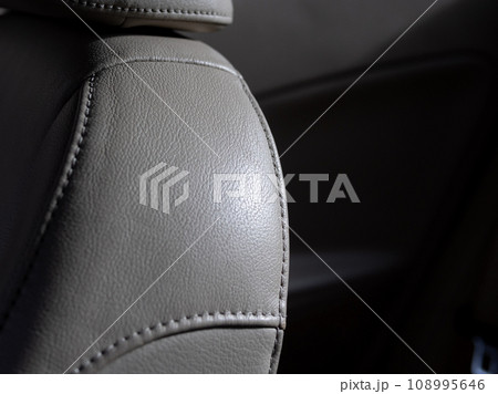 Part of leather car seat details. close up detail Part of leather car seat details. close up detail 108995646