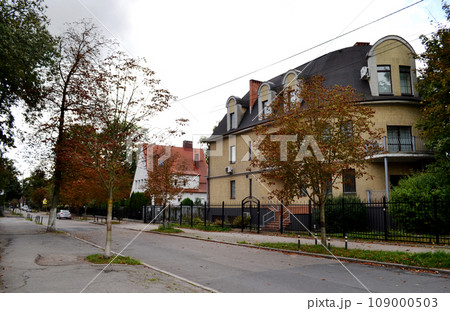 Kaliningrad, Russia, Amalienau district, elite district, central street, old townhouses in german style, autumn landscape Kaliningrad, Russia, Amalienau district, elite district, central street, old townhouses in german style, autumn landscape 109000503