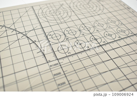 closeup grey cutting mat, equipment in office closeup grey cutting mat, equipment in office 109006924