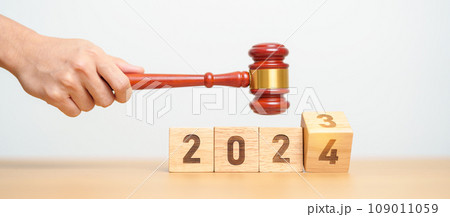 2023 chcnge to 2024 year block with judge gavel on table. Law, lawyer, judgment, justice auction and bidding concept 2023 chcnge to 2024 year block with judge gavel on table. Law, lawyer, judgment, justice auction and bidding concept 109011059