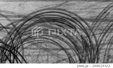 Aerial view tire track mark on asphalt tarmac road race track texture and background, Abstract background black tire track skid on asphalt road, Tire mark skid mark on asphalt road. Aerial view tire track mark on asphalt tarmac road race track texture and background, Abstract background black tire track skid on asphalt road, Tire mark skid mark on asphalt road. 109014322
