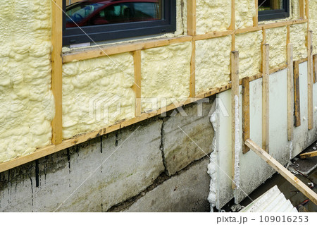 Thermal insulation of the concrete foundation of the residential house with foam boards Thermal insulation of the concrete foundation of the residential house with foam boards 109016253
