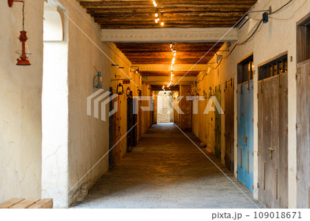 Narrow streets that create shade on a hot day in the old city of Dubai Creek and Bur district. Travel destinations and heritage village 109018671