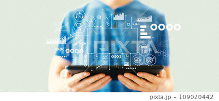 Marketing concept with man using a tablet 109020442