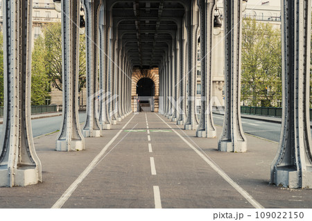 Long row of metal columns of elevated subway. Bir Hakeim Bridge in Paris, France Long row of metal columns of elevated subway. Bir Hakeim Bridge in Paris, France 109022150
