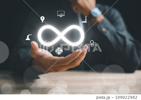 Businessman displays circular infinity symbol, depicting circular economy and infinite opportunities. Strategy of sustainable investment, banking, and financial growth. technology infinity data Businessman displays circular infinity symbol, depicting circular economy and infinite opportunities. Strategy of sustainable investment, banking, and financial growth. technology infinity data 109022982