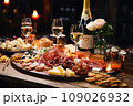Light snacks in a plate on a buffet table. Assorted mini canapes, delicacies and snacks, restaurant food at event. A gala reception. Decorated delicious table for a party goodies. 109026932