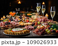 Light snacks in a plate on a buffet table. Assorted mini canapes, delicacies and snacks, restaurant food at event. A gala reception. Decorated delicious table for a party goodies. 109026933