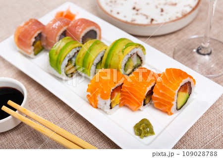 Delicious various sushi set served on plate. Sushi roll uramaki. Japanese food closeup 109028788