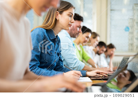 Woman using laptop during lesson in university 109029051
