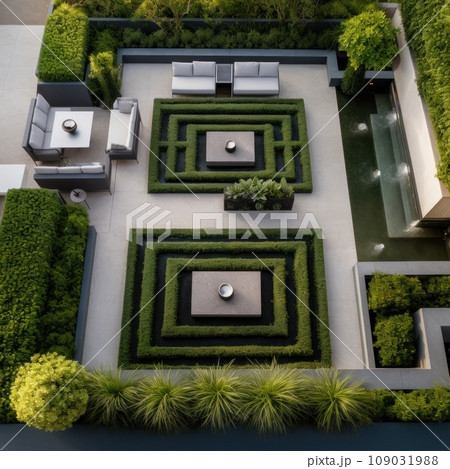 A stunning aerial shot of a modern garden design featuring a geometric pattern of hedges. 109031988