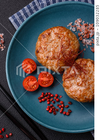 Delicious fresh fried minced fish cutlets with spices and herbs Delicious fresh fried minced fish cutlets with spices and herbs 109032285