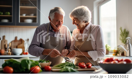 touching stock photo of an elderly couple cooking breakfast together in their small but cozy kitchen 109033082