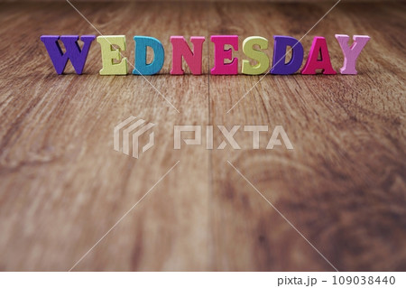 wednesday alphabet letter with space copy on wooden background wednesday alphabet letter with space copy on wooden background 109038440