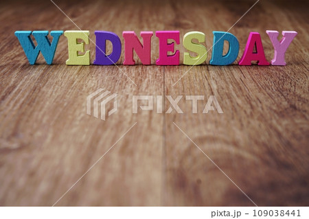 wednesday alphabet letter with space copy on wooden background wednesday alphabet letter with space copy on wooden background 109038441
