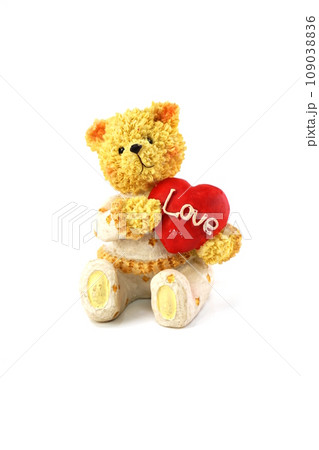 teddy bear and red heart on white background teddy bear and red heart on white background 109038836