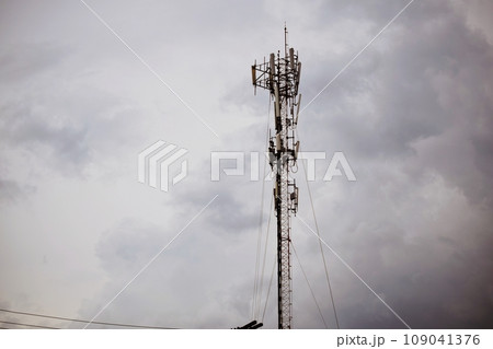 the cellular telecommunication antennas on the roof of the building the cellular telecommunication antennas on the roof of the building 109041376