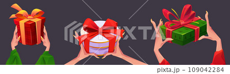 Female hands holding gift box 109042284