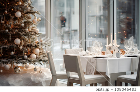 Empty elegant traditional Christmas family dinner table served with dinnerware 109046483